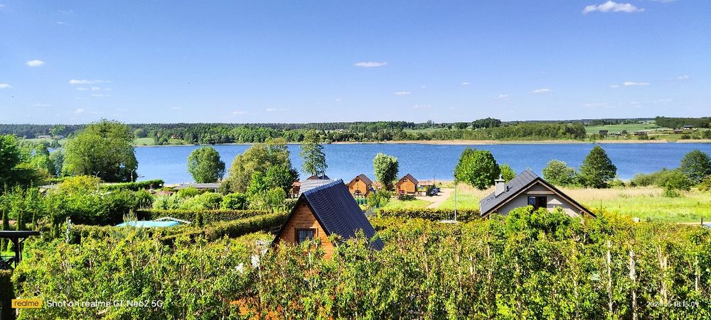 Domek letniskowy nad jeziorem Wawrowice jacuzzi bania