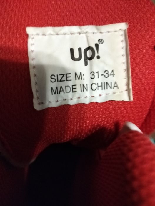 Роликовые коньки UP