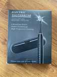 Szczoteczka elektryczna do zębów 8 koncówek + etui