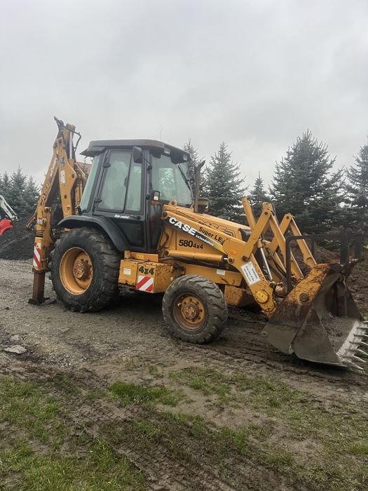 Koparkoładowarka koparka  Case 580 SLE SUPER stan jcb caterpillar
