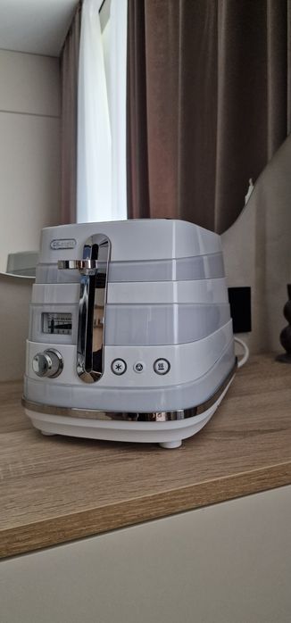Продам тостер DeLonghi