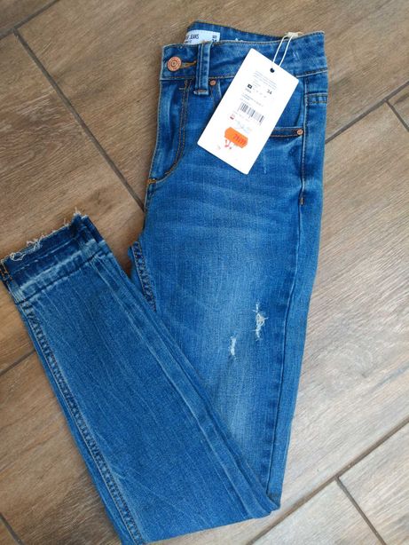 Nowe spodnie Jeansy skinny Diverse r 32