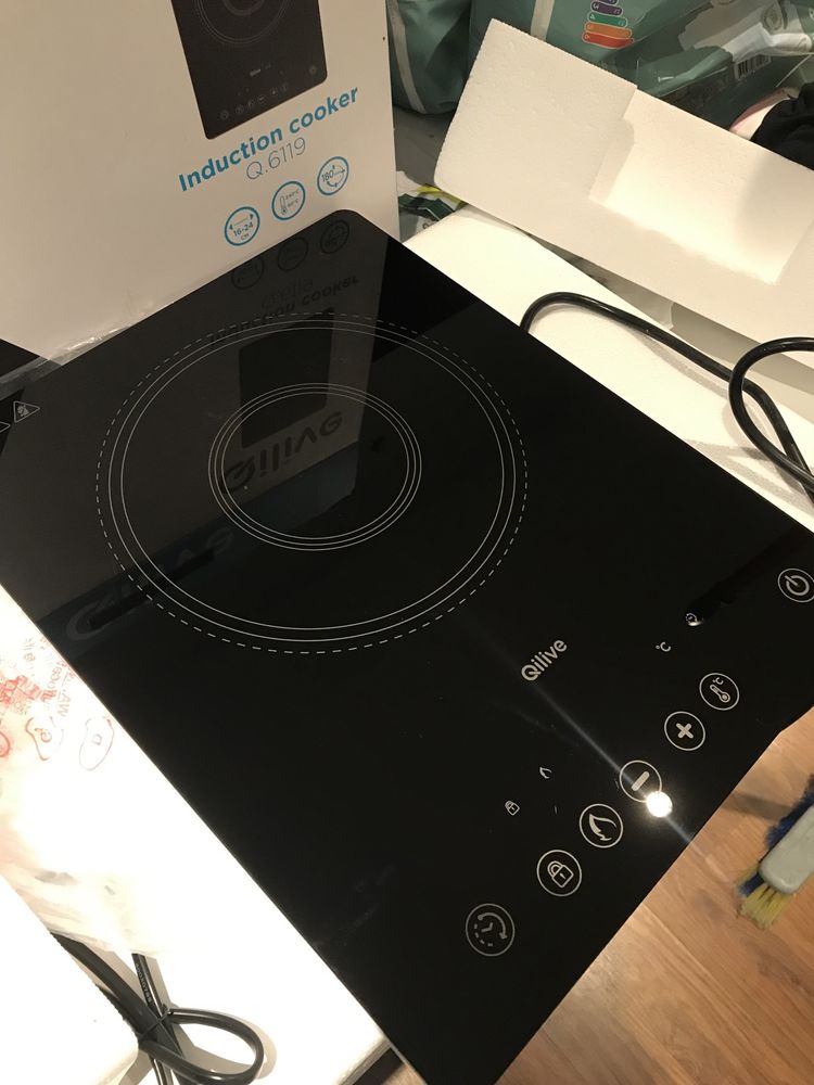 1 cooker indução em ótimo estado .
