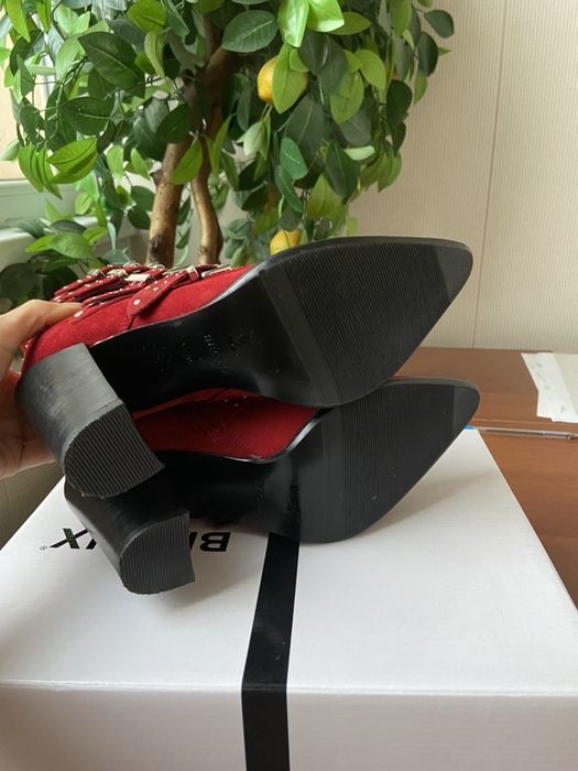 Актуальні шкіряні черевики козаки bronx americana