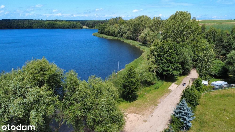 Drewniany domek z działką 544 m² – tylko 3 minuty od jeziora!