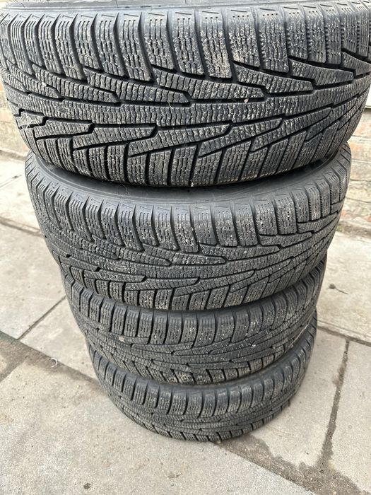 Комплект дисків Audi і зимова гума Nordman R16