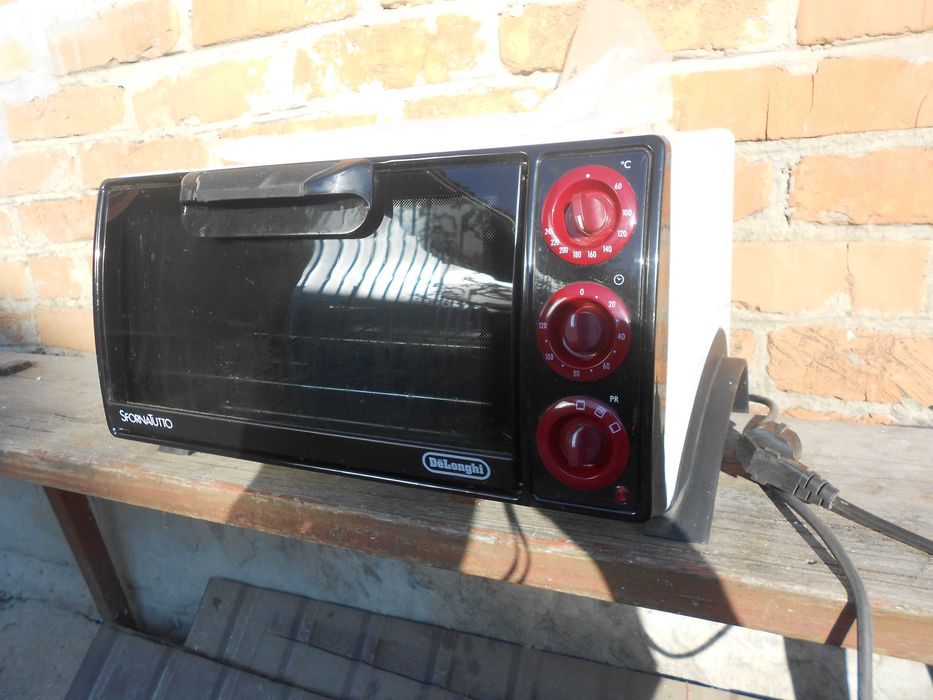Электрическая печь DELONGHI