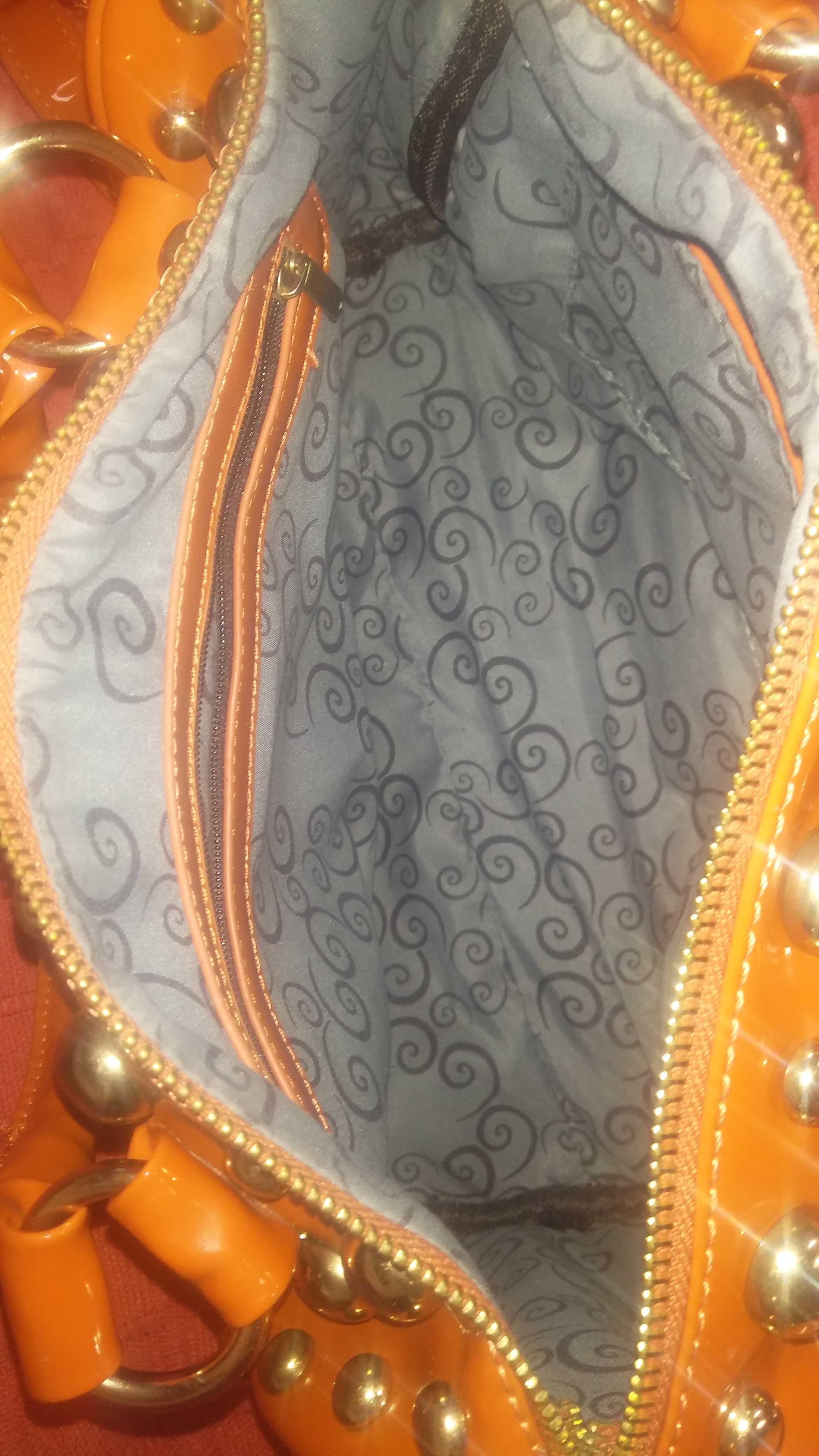 Mala verniz com tachas