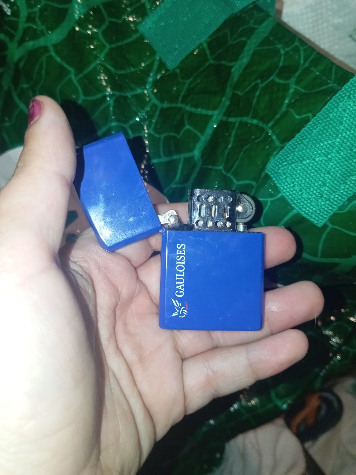 Isqueiro com marca na foto gás fraco
