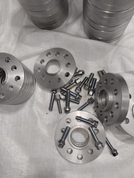 Болти колеса проставки диски центровочні кільця