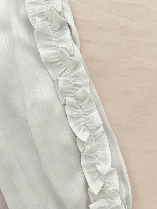 Blusa pormenor folhos