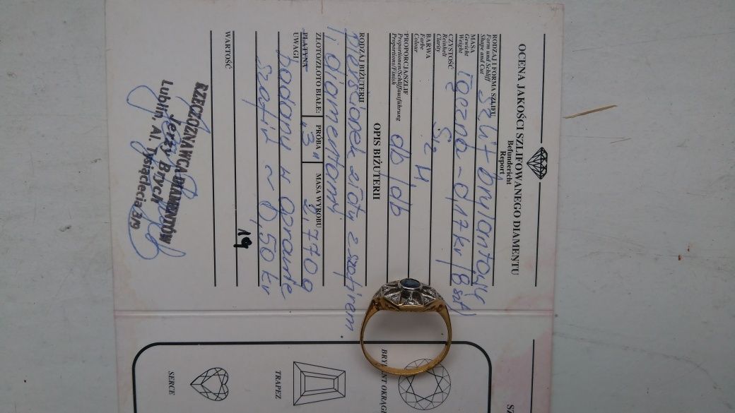 Pierścionek złoty z diamentami i szafirem, certyfikat