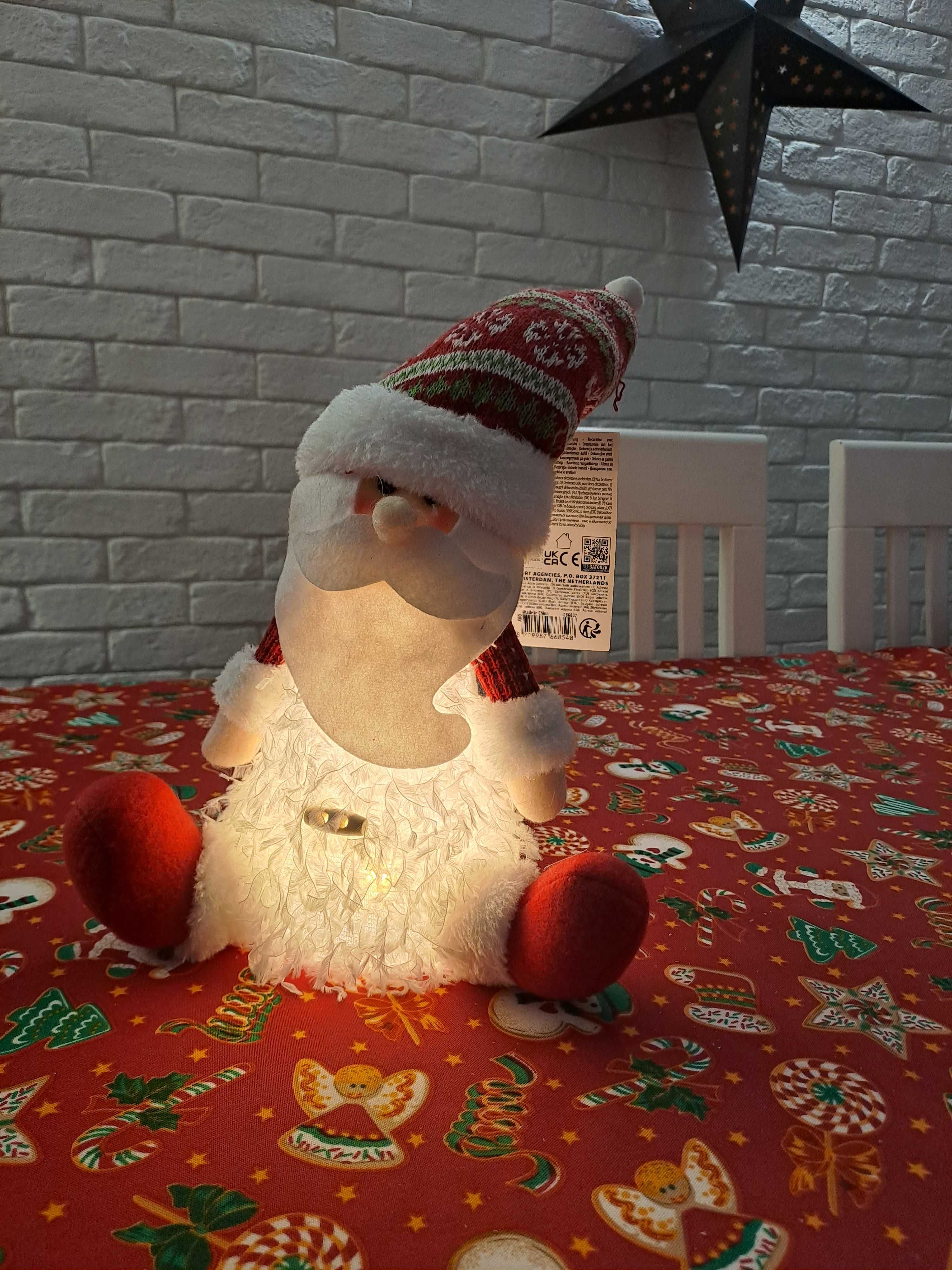 Święty Mikołaj pluszowy 27cm LED