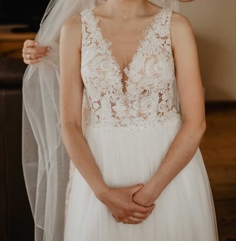 Suknia ślubna z piękną koronką rozmiar 36