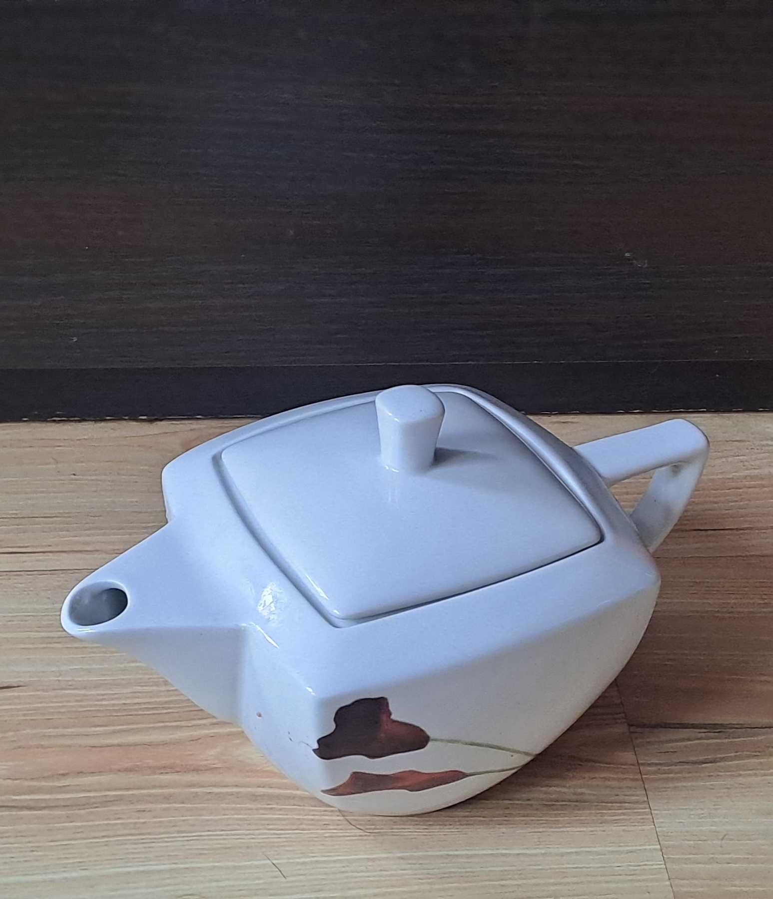 Czajnik i filiżanka porcelana