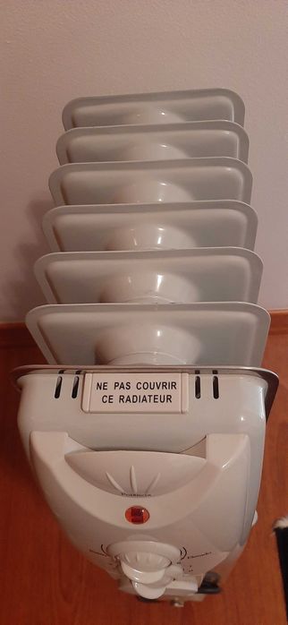 Aquecedor a óleo marca Select 6 elementos