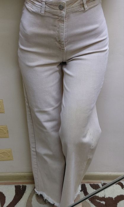 Джинси жіночі широкі