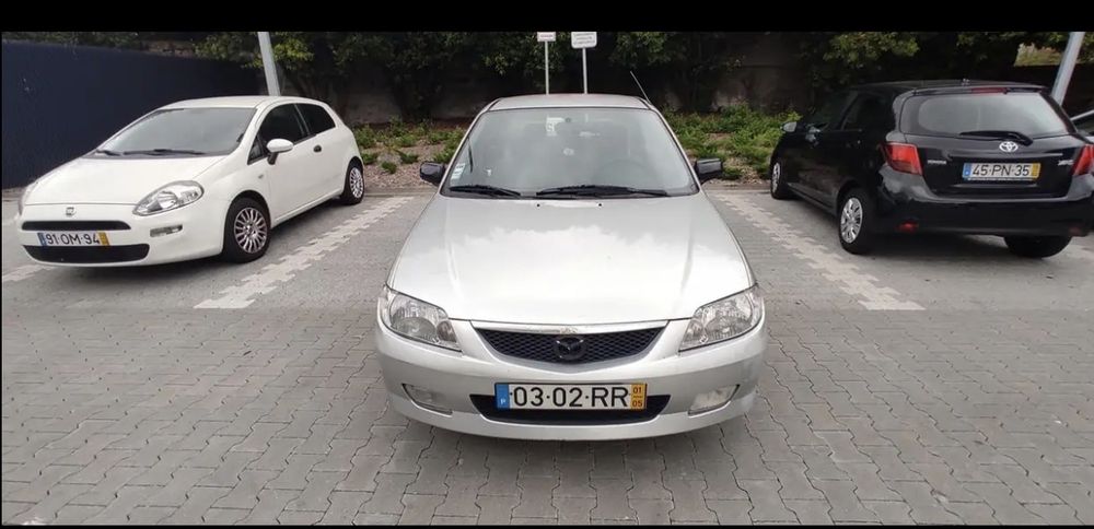 Mazda 323 1.4 - gasolina - 2001