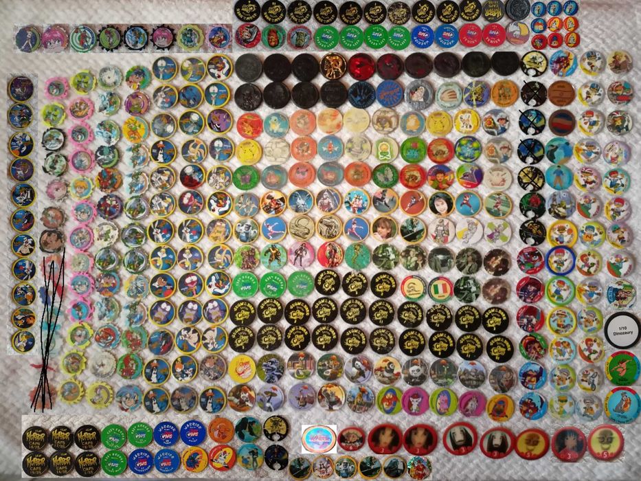 Tazo lays, chupa caps, cheetos, digimon, pokemon, spinnery boinx shrek