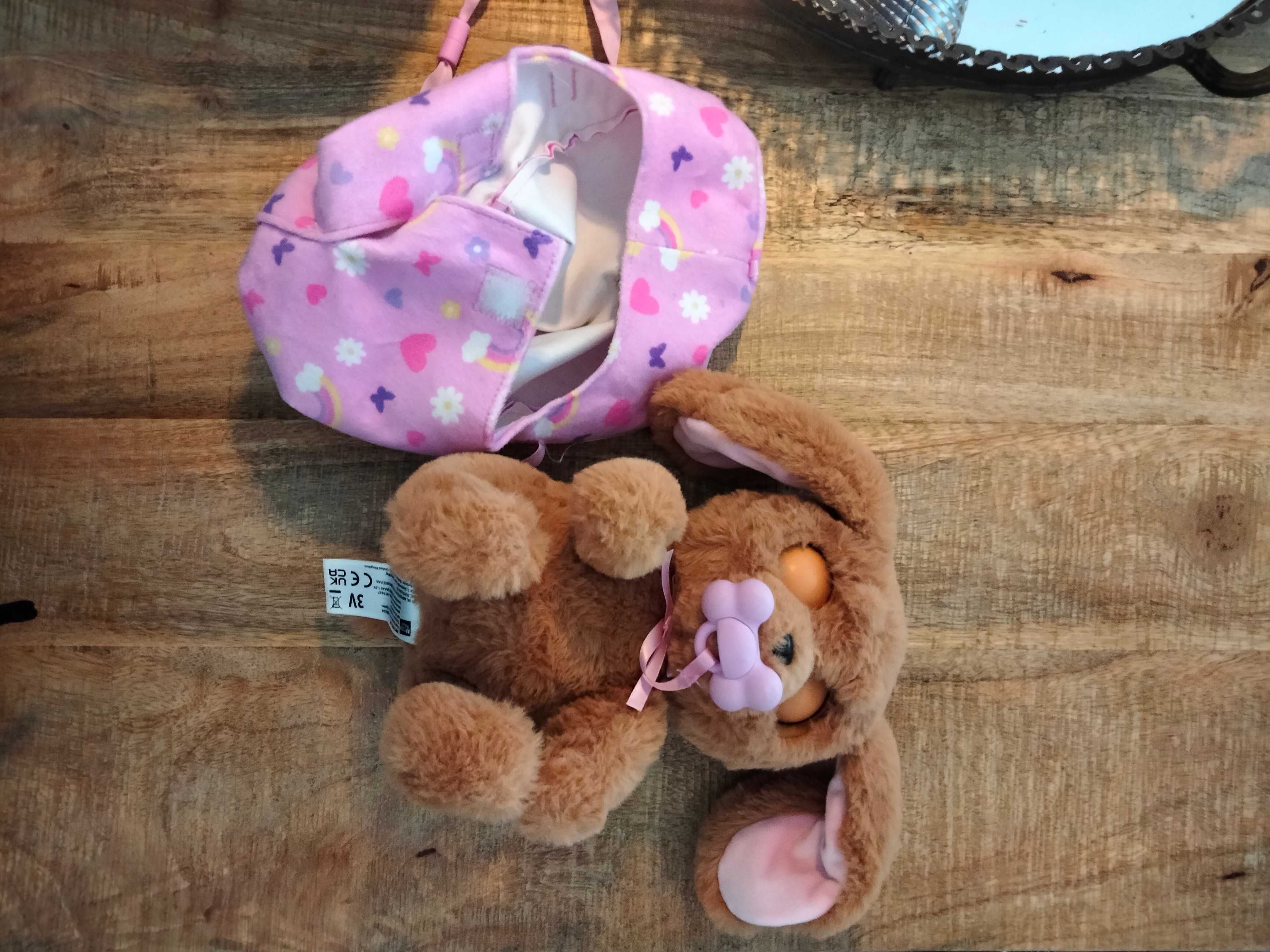 Peluche a pilhas com chucha