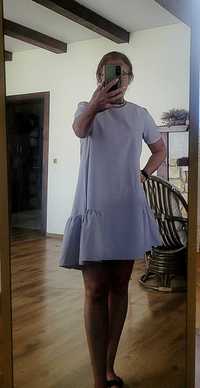 błękitna sukienka letnia rozkloszowana