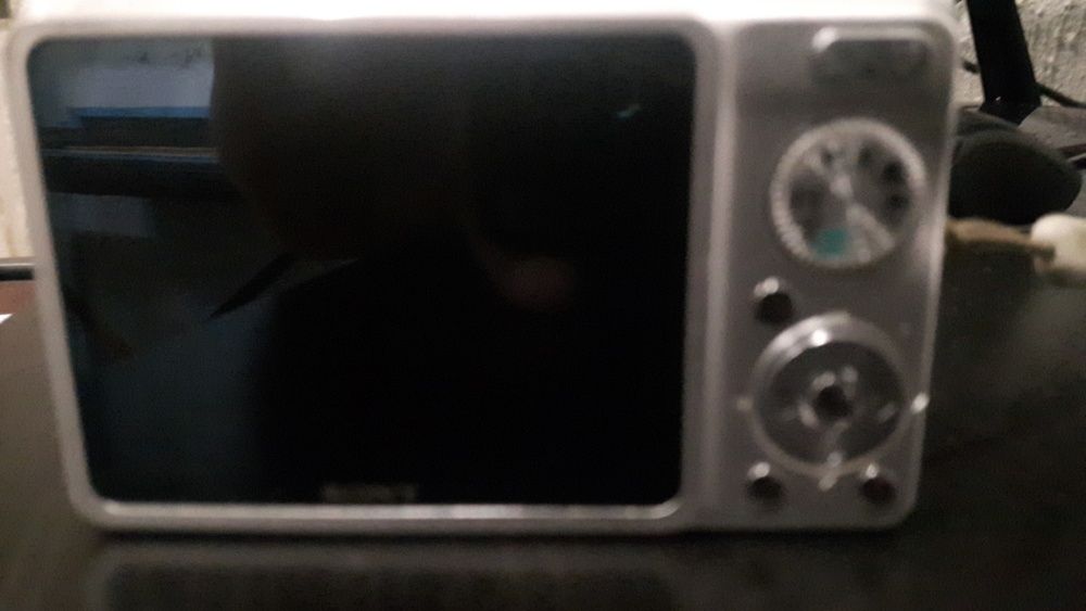 Máquina fotográfica  c imagem Sony e carregador