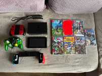 Nintendo Switch z 6 grami (wersje pudelkowe) + grip + ekstra pad