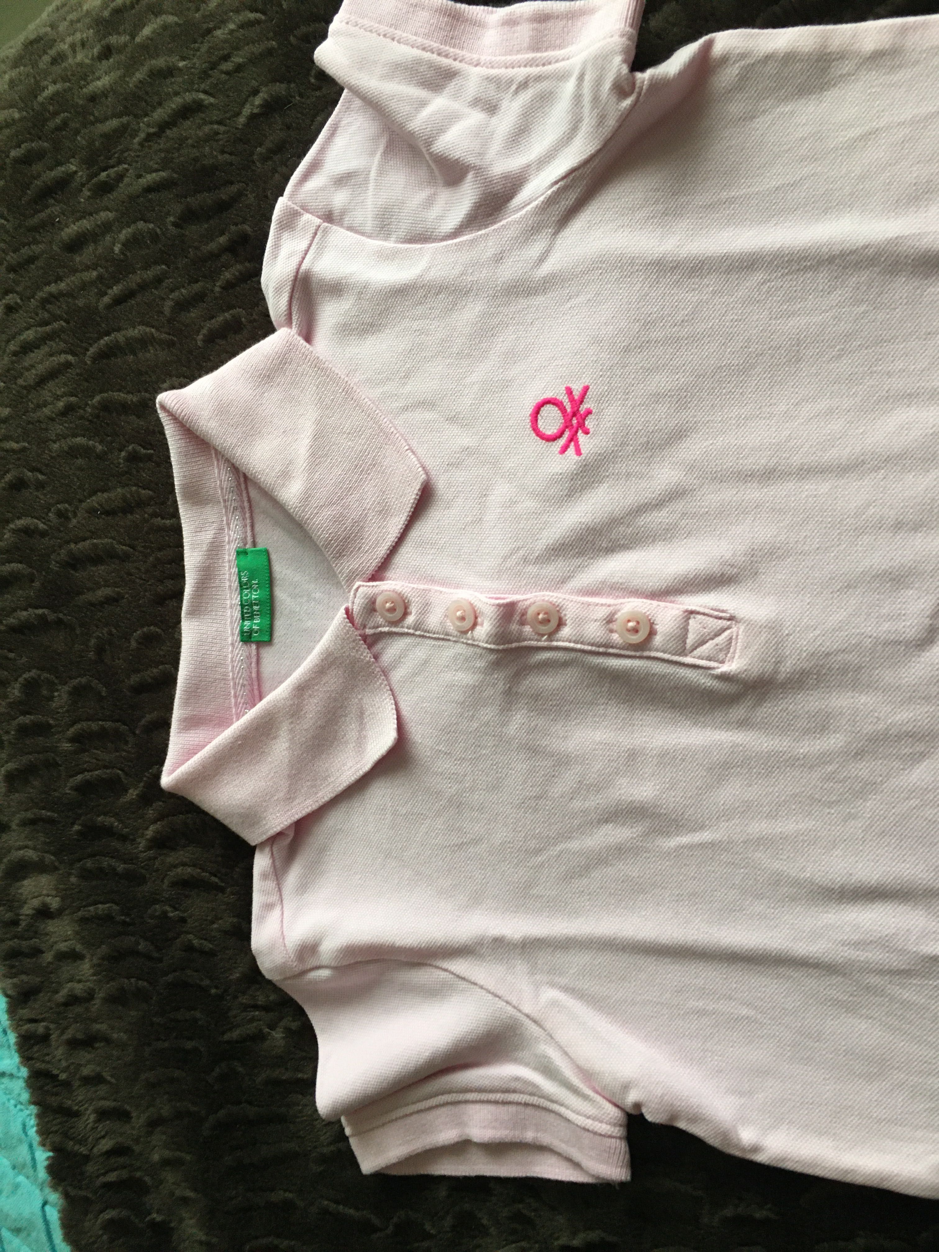 Polo rosa da marca benetton