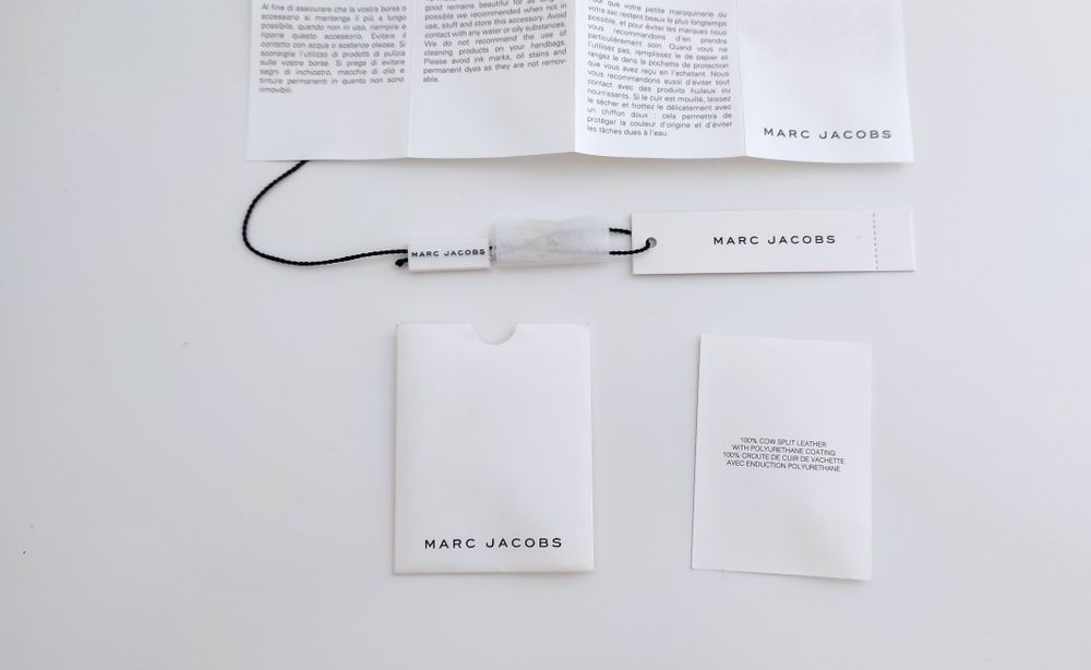 Mala Marc Jacobs de pele como nova