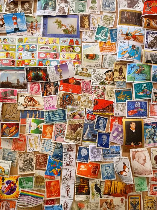 Znaczki pocztowe cały świat 1000szt + 100szt GRATIS