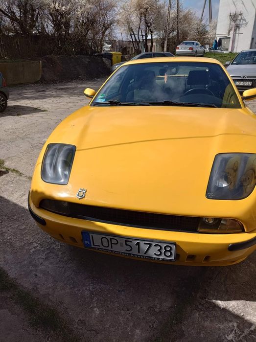 Fiat Coupe.  Stan bardzo dobry  jak na Auto z tego roku :)