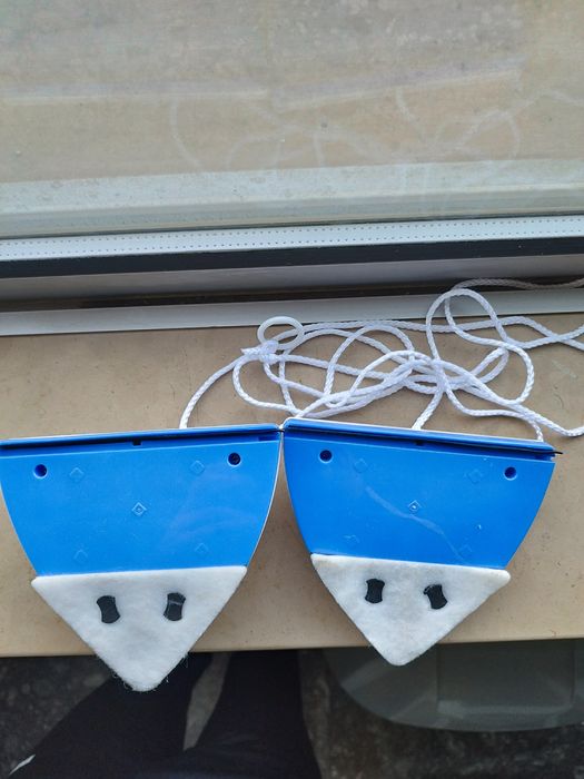 Limpeza de vidros magnético