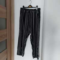 Czarnobiałe paski spodnie ze ściągaczem 38