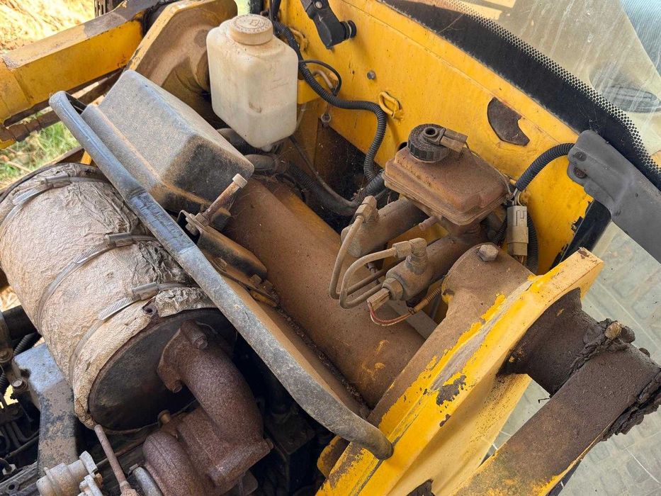 Retro Escavadora  Komatsu wb97r de Serviço