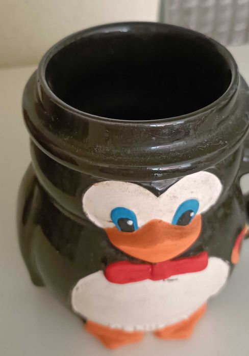 Pinguim caneca publicidade Penilan