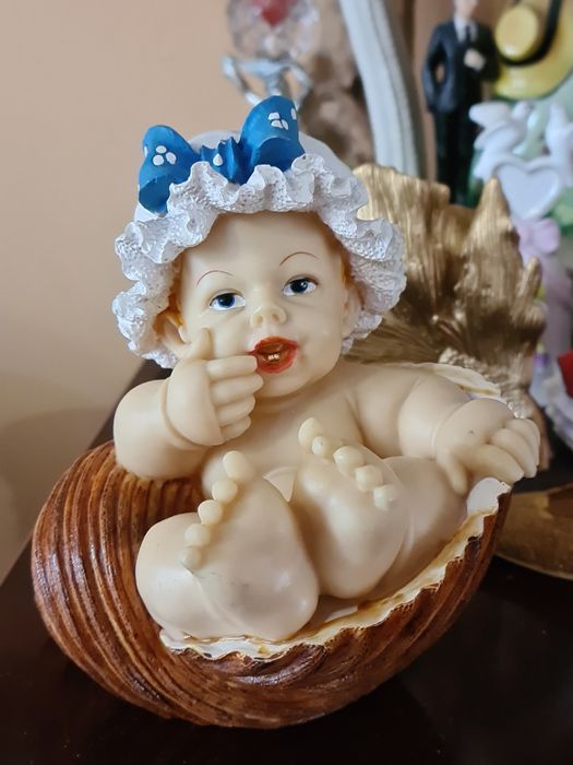 Skarbonka dziecko w muszli