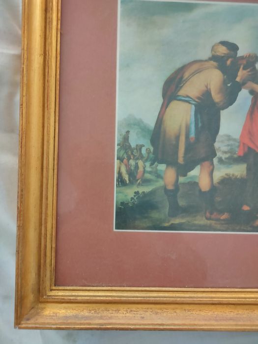 Moldura com cópia de pintura de Murillo.