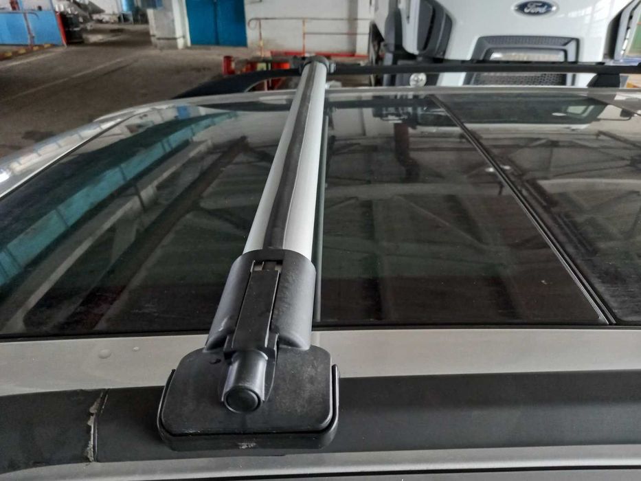 Перемычки Аэро с креплениями под штатные рейлинги на BMW X5