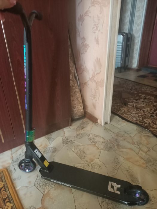 Самокат трюковый reaction stunt 3