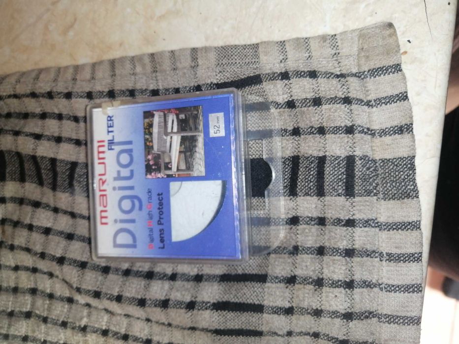 Лінза 52 MARUMI жрдеого разу не була