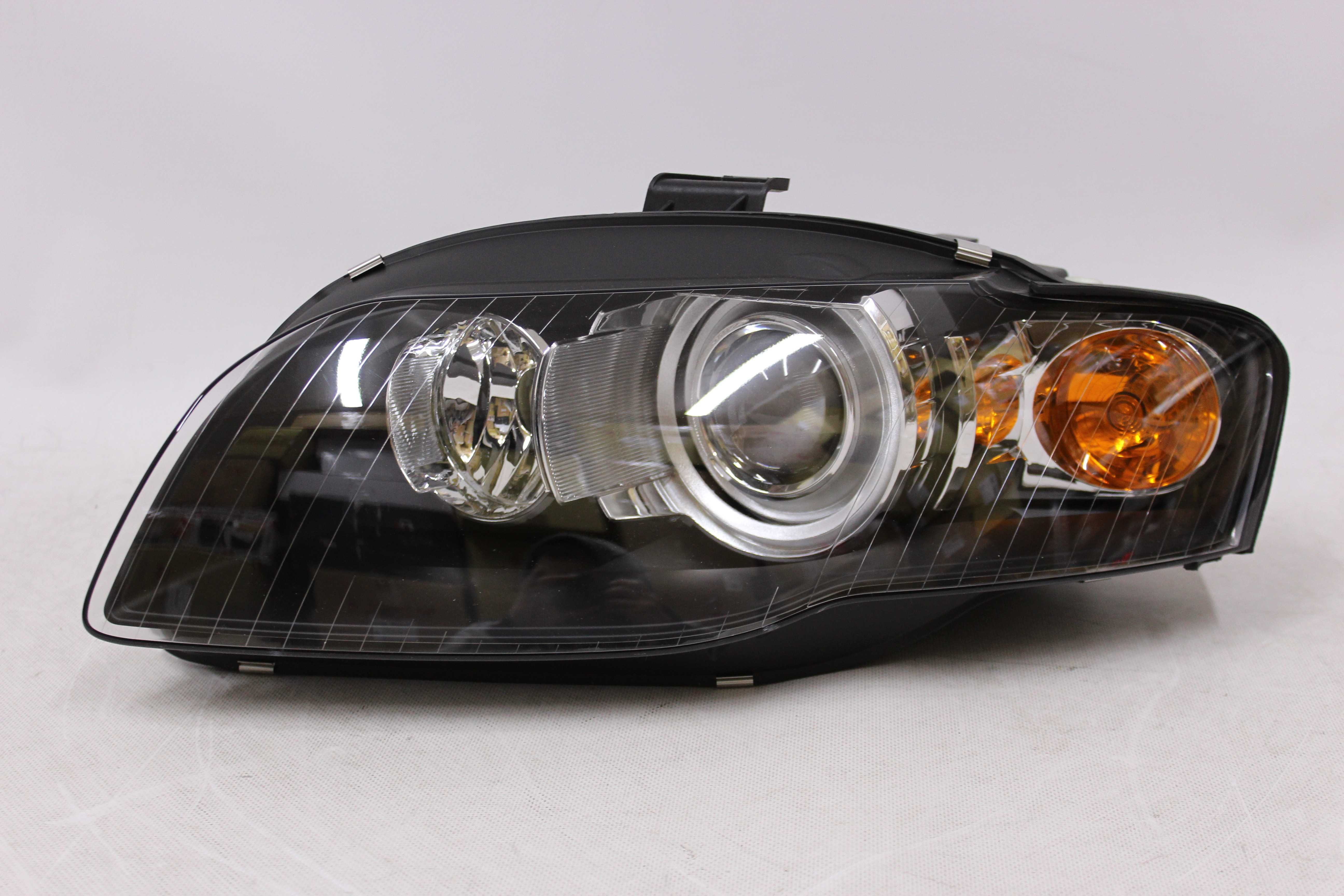 Reflektor Lampa lewa przód przednia AUDI A4 B7 04-08 D1S XENON NOWA