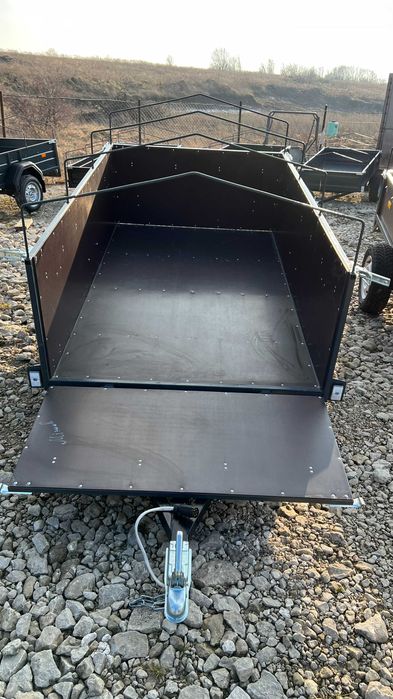 Прицеп до легкового авто : 2,15 х 1,26 м борт 60см , фанера