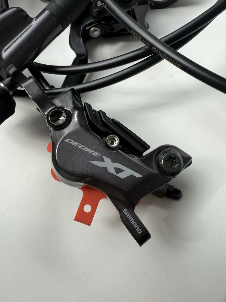 Нові гідравлічні 4-х поршневі гальма Shimano deore XT M8120