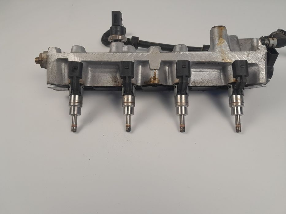 Форсунки бензинові 1.6FSI VW Touran 2003-2010p 03C906036A