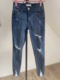 Elastyczne jeansy rurki z dziurami Denim Co r.38