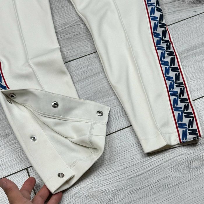 Спортивные штаны Nike Taped Pants спортивні штани найк теч фліс tech