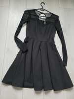 Czarna rozkloszowana sukienka siatka dekolt
