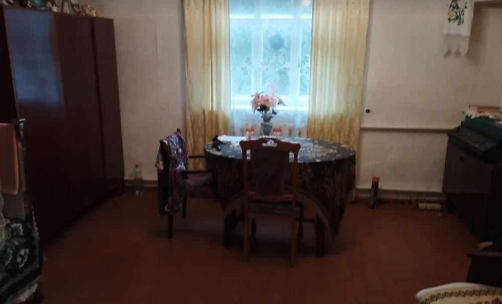 "1/2 частина будинку   з ділянкою і гаражем