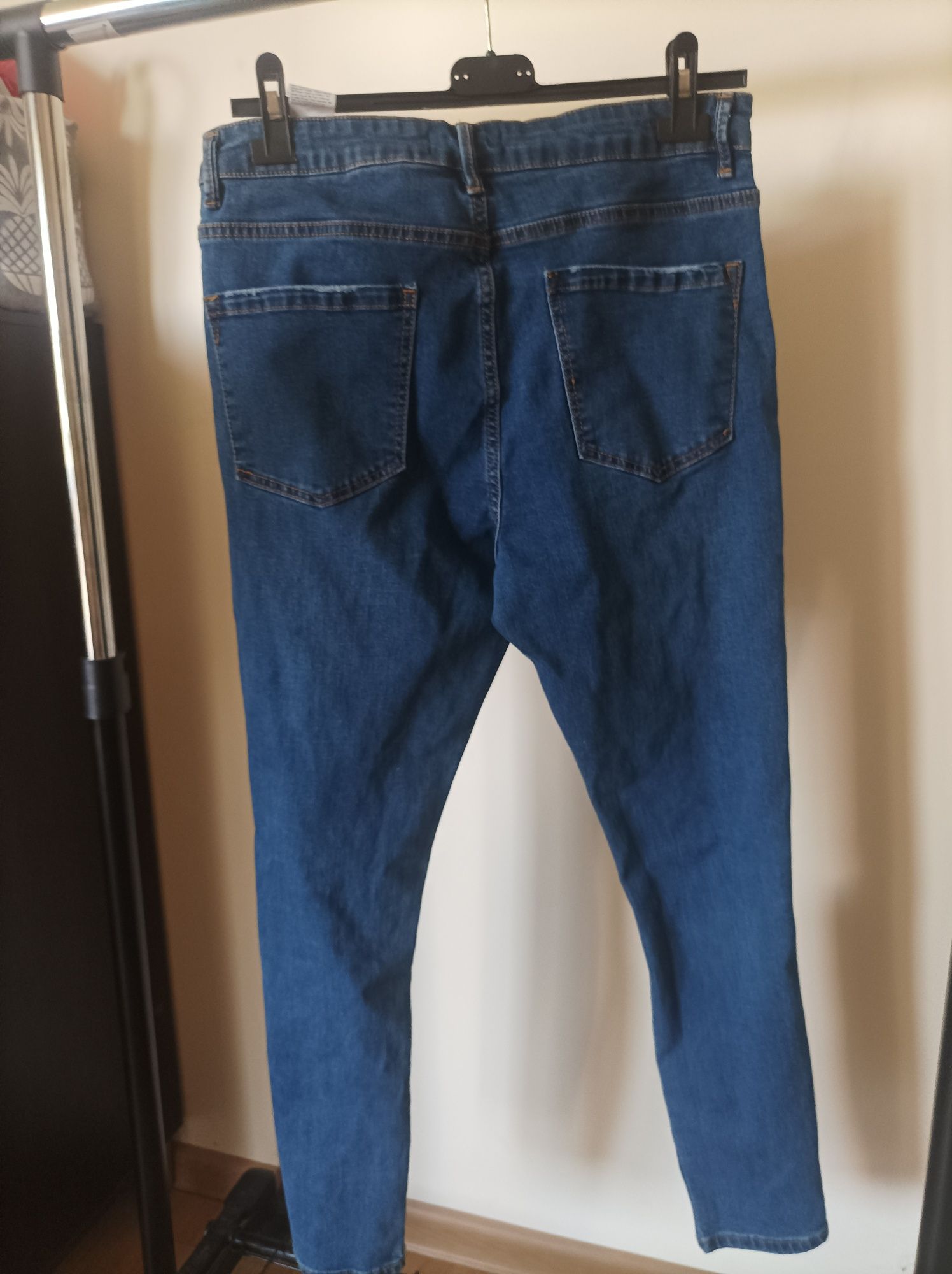 Spodnie jeans 40