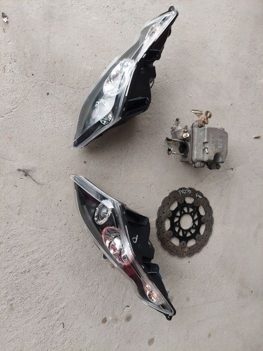 Kymco dink Street 125 lampa lewa prawa przód głowica tarcza